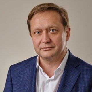 Олег Белай